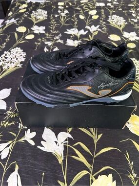 Men's Black Athletic Soccer Shoes with Orange Accents